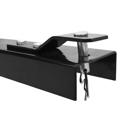 Tipping Trailer for Lawn Mower 150 kg Load - Side view showcasing its black steel construction and garden-friendly design.