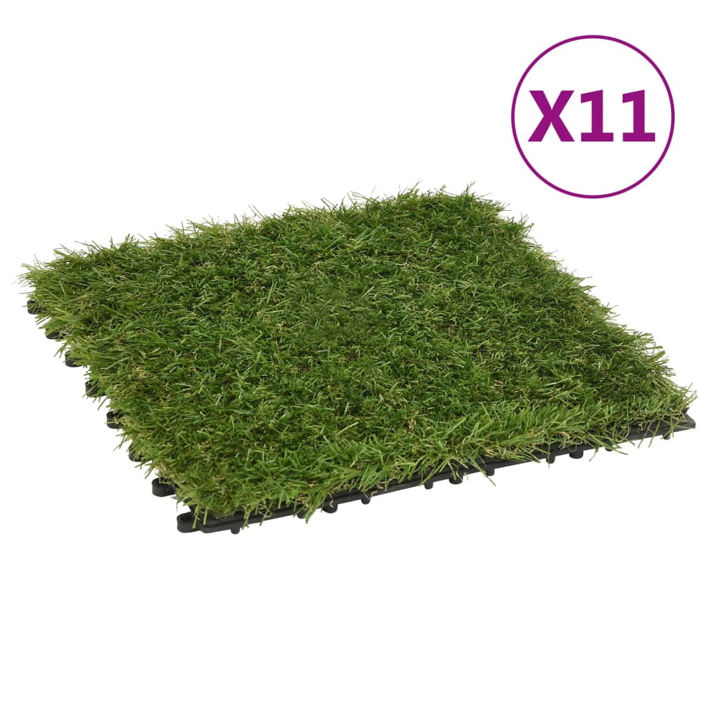 Artificial Grass Tiles 11 pcs Green 30x30 cm displayed on a patio, showcasing their lush and realistic appearance.
