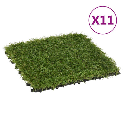 Artificial Grass Tiles 11 pcs Green 30x30 cm displayed on a patio, showcasing their lush and realistic appearance.