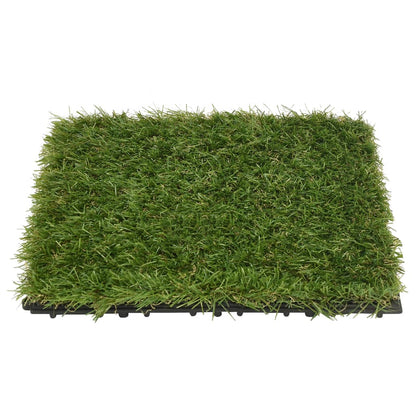 Installation of Artificial Grass Tiles 22 pcs Green 30x30 cm demonstrating the plug-in system for easy assembly.