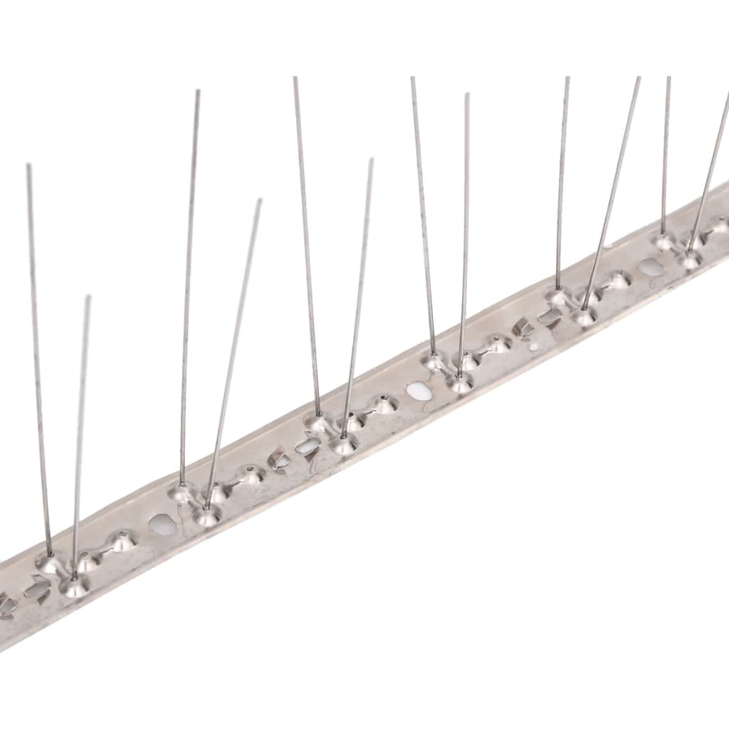 Application of 2-row Stainless Steel Bird & Pigeon Spikes Set of 20 10 m on a garden wall for garden protection.