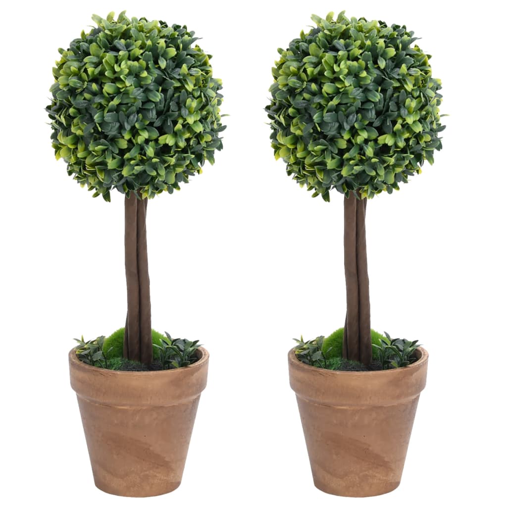 Artificial Boxwood Plants 2 pcs with Pots Ball Shaped Green 56 cm displayed in a stylish interior, adding a vibrant touch of greenery.