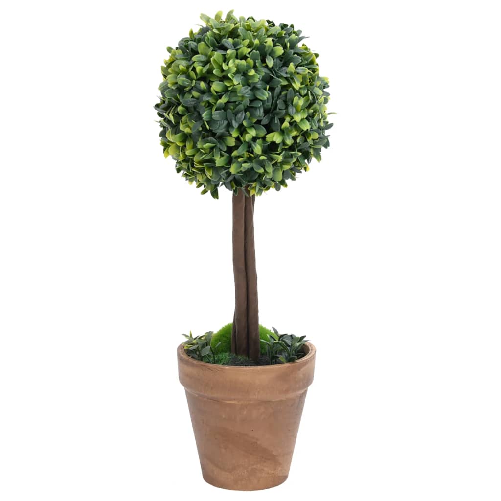 Artificial Boxwood Plants 2 pcs with Pots Ball Shaped Green 56 cm perfectly arranged in a bright living space for a fresh and inviting atmosphere.