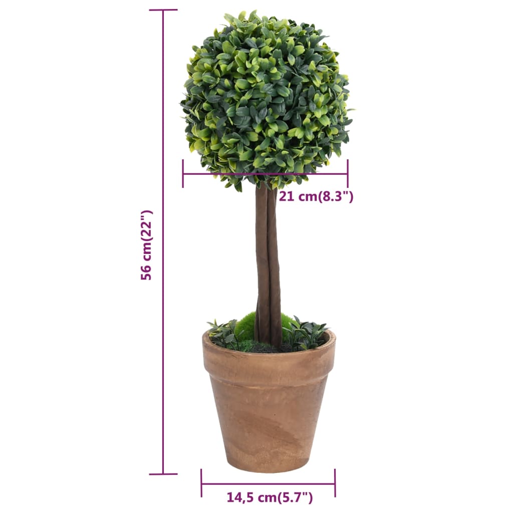 Stylish indoor setting featuring Artificial Boxwood Plants 2 pcs with Pots Ball Shaped Green 56 cm enhancing the aesthetic of the living space.