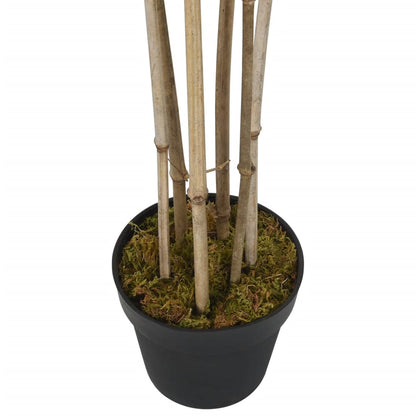 Close-up view of the realistic textile fibre leaves of the Artificial Bamboo Tree, showcasing its lush green foliage and natural texture.