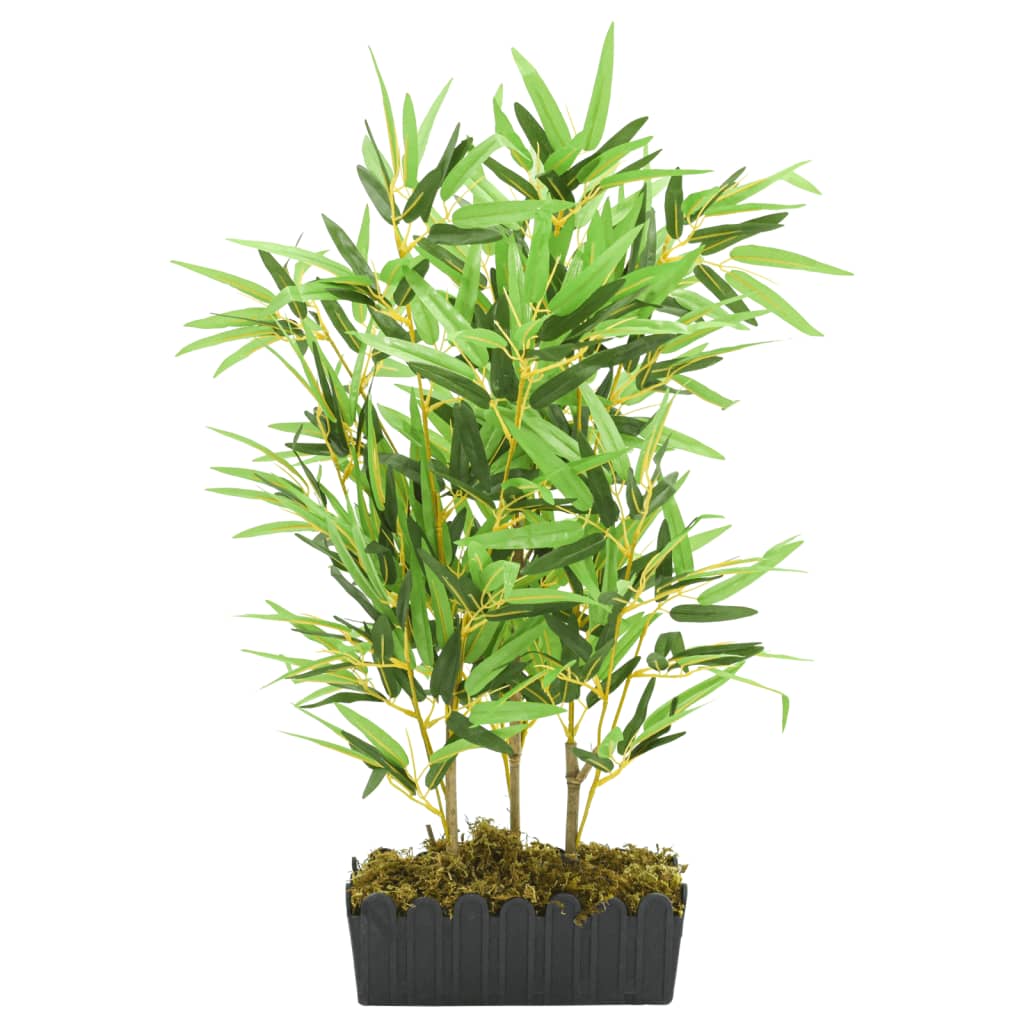 Artificial Bamboo Tree 500 Leaves 80 cm Green in a stylish living room setting, perfect for adding a touch of greenery.