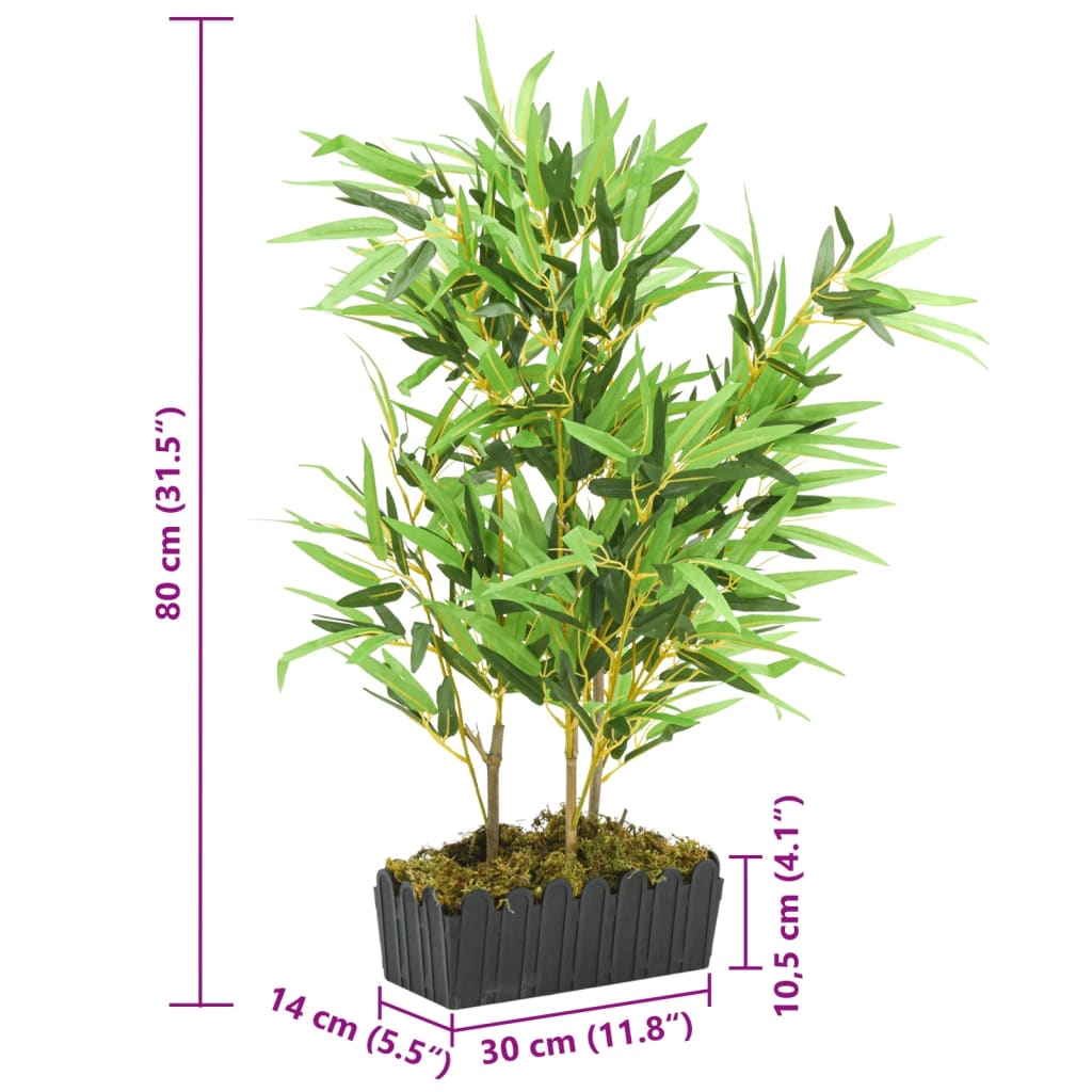 Outdoor view of Artificial Bamboo Tree 500 Leaves 80 cm Green, creating a vibrant atmosphere on a patio or garden area.