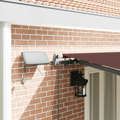 Manual Retractable Awning with LEDs Brown 600x300 cm