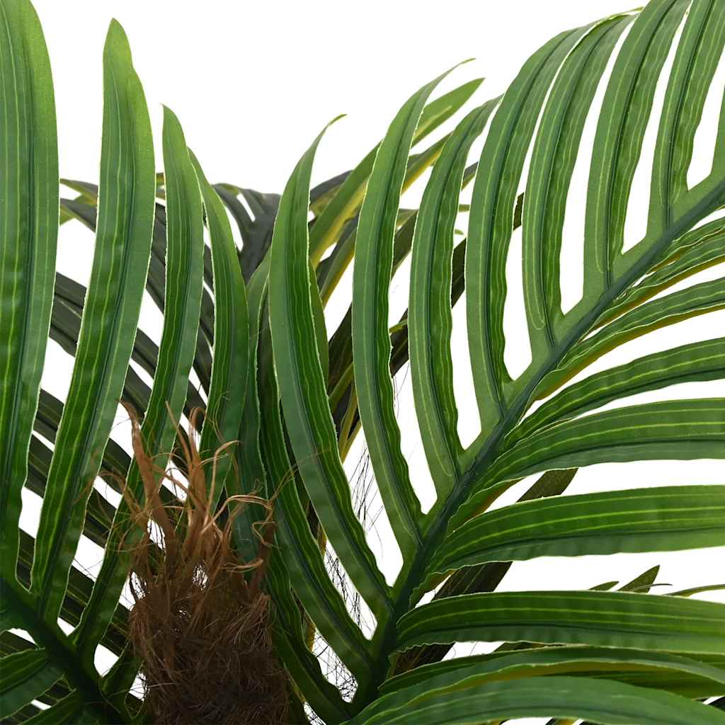 Artificial Palm Tree 6 Leaves 100 cm Green showcasing its realistic leaves made of PEVA material, perfect for adding a tropical touch to any indoor or outdoor space.